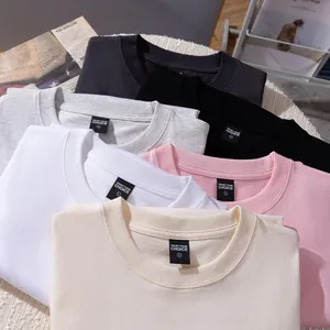 Vue détaillée de débardeurs en coton 260g multicolores avec étiquettes Trust Your Choice.