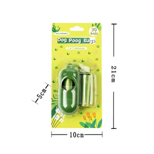 Green pill-shaped dog waste bag dispenser set with 30 bags, dimensions 21x10x5cm