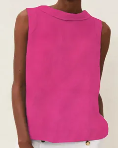 Detail shot of a vibrant pink cotton linen sleeveless top featuring a sleek boat neckline