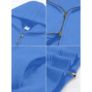 Details van een blauwe zware hoodie met dubbele rits en geribbelde manchetten