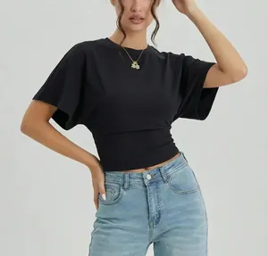Close-up of a stylish women's black crew neck cropped T-shirt with loose fit sleeves