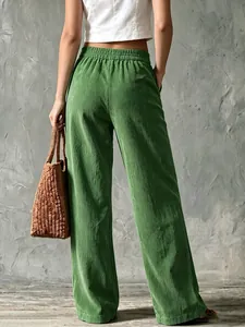 Detailed rear view of vintage green corduroy wide leg trousers showing fabric texture