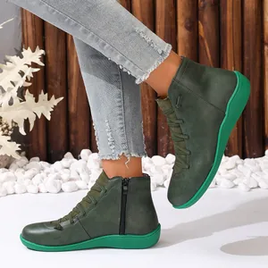 Bottines de style britannique pour femmes vert foncé avec semelle verte vive