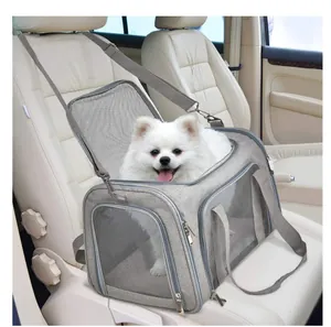 Close-up of a foldable breathable grey mesh pet carrier bag installed on a car seat