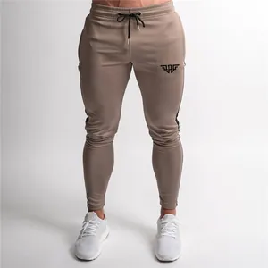 High-quality men's khaki slim-fit joggers with side stripes and drawstring waist