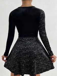 Elegant black sequin party dress with long sleeves and cinched waist
