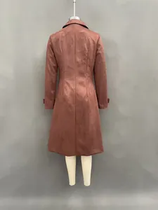 Back view of a long russet suede trench coat with tailored seams and lapel collar.