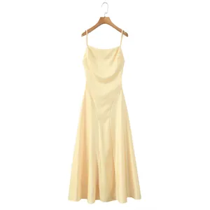 Elegant champagne spaghetti strap backless formal dress with pleated bodice detail