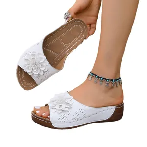 Stylish white floral wedge slippers for women, perfect for summer beach wear