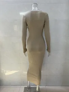 Elegant beige long-sleeved ribbed knit bodycon maxi dress shown from the back view