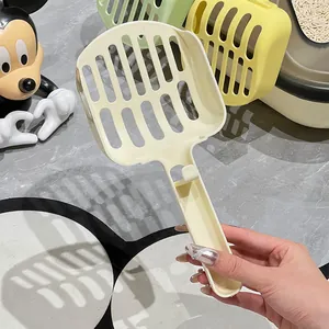 Durable large cream cat litter scoop with long handle and wide slots for easy cleaning