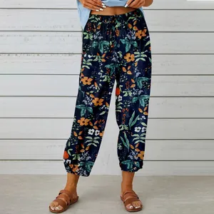 Detailed view of high-waist cotton linen pants with vintage floral print and drawstring
