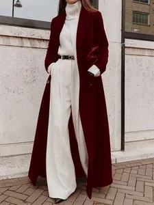 Elegant long burgundy wool coat for women featuring a minimalist winter street style