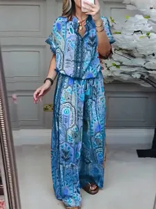 Casual two-piece set with blue floral print short sleeve top and wide leg pants