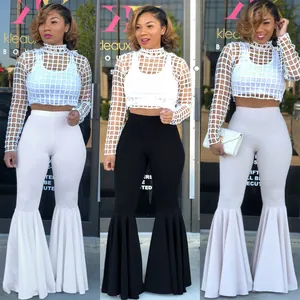 Elegantes pantalones de campana de cintura alta para mujer con volantes en blanco y negro