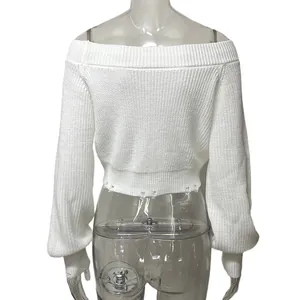 Detailed back view of a white off-the-shoulder cropped knit sweater on a mannequin