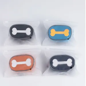 Set of four colorful dog poop bag dispensers shown in individual frosted zipper bags