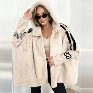 Detailed view of women's oversized faux fur hooded jacket with sleeve stripes