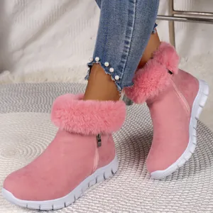 Pink fur-lined snow boots for women featuring thick white soles and a side zipper closure
