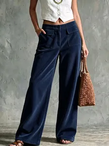 Full view of navy retro corduroy wide-leg pants with double pocket high-waist design.