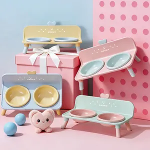 Modern elevated stainless steel double pet bowl stand for cats and small dogs in pastel colors