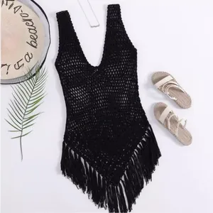 Bohemian black crochet beach cover-up featuring V-neck and tassel hem decoration