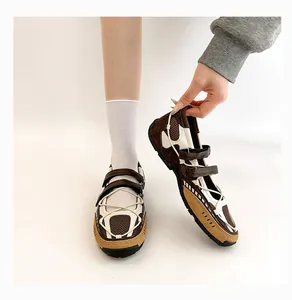 Detailed view of brown and beige functional Mary Jane ballet sneakers with adjustable straps