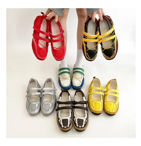 Detailed view of colorful functional ballet Mary Jane sneakers in multiple vibrant colors.