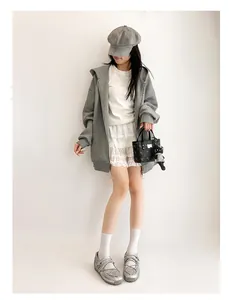 Full body outfit view of metallic silver functional Mary Jane ballet flat shoes in grey tone