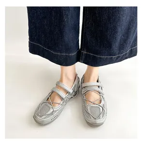 Silver mesh Mary Jane flats with functional techwear design, cross-straps, and sporty sole
