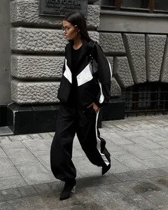 Stylish black and white color-block women's tracksuit in casual street style