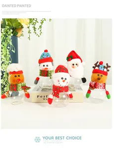 Set of five festive Christmas-themed transparent candy jars with various plush character lids.