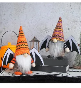 Pair of cute Halloween gnome plush dolls with bat wings and festive knit patterned hats