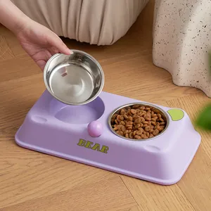 Detail showing removable stainless steel bowls on a high-quality purple pet double feeder