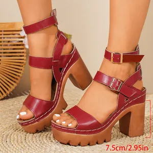 Close-up detail of the 7.5cm chunky high heel and platform on these red strappy sandals