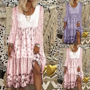 Bohemian style floral tiered long sleeve dress in pink and purple color variants for women