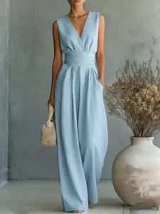 Elegant light blue V-neck sleeveless jumpsuit with cinched waist and wide leg design