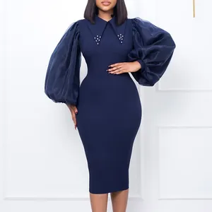 Elegant navy blue pencil dress featuring mesh puff sleeves and pearl-studded collar.