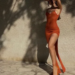Sexy orange knit maxi dress with high side slit for summer vacation resort wear
