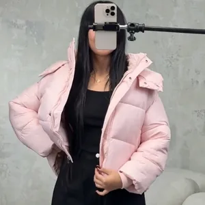 Chic pink short hooded puffer jacket for women with cozy street casual style