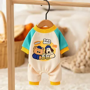 Cute cartoon dog jumpsuit with bear print in teal and yellow for Bichon Teddy home wear.