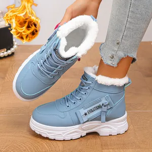 Bottes de neige d'hiver bleues pour femmes avec doublure en fausse fourrure blanche