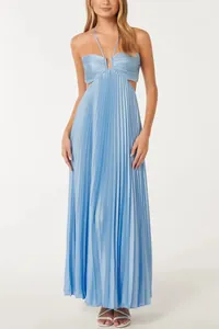 Detail view of light blue pleated maxi dress with halter strap and cutout design