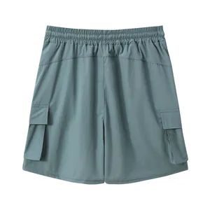 Back view of men's sage green four-way stretch quick-dry cargo shorts with side pockets