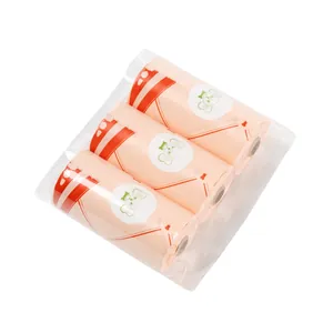 Set of three rolls of peach degradable EPI pet waste bags with red bone pattern print