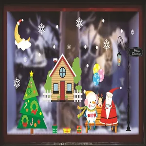 Vista detallada de pegatinas navideñas para ventanas con Papá Noel y un muñeco de nieve.