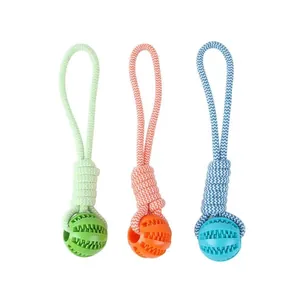 Detailed view of durable TPR dog toy balls with woven ropes for teeth cleaning