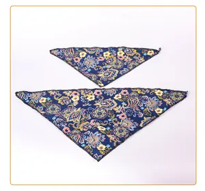 Set of two navy blue pet bandanas with vibrant paisley floral pattern for cats and dogs