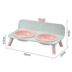 Elevated double pet bowl with pink bowls and mint green stand for cats and dogs