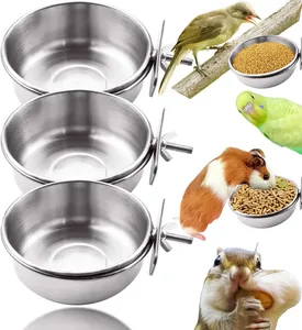 Detailed view of stainless steel pet bowls with mounting hardware for birds and rodents